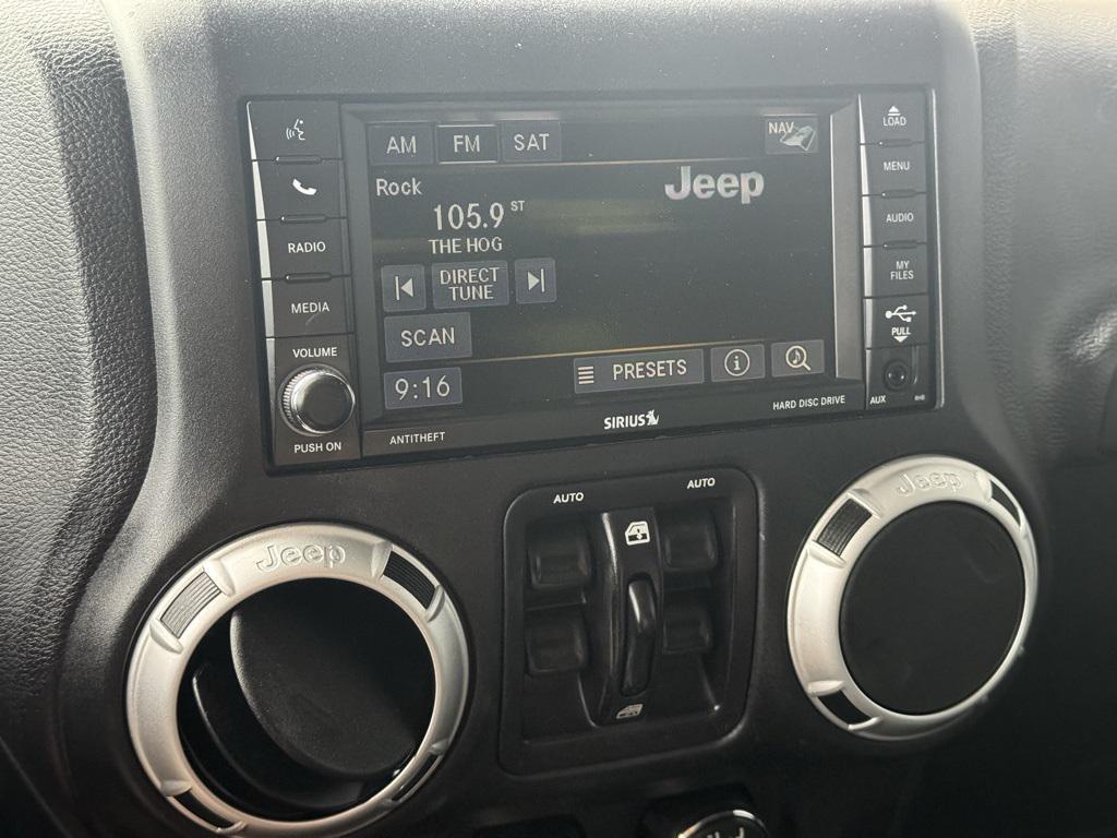 used 2016 Jeep Wrangler Unlimited car, priced at $19,679
