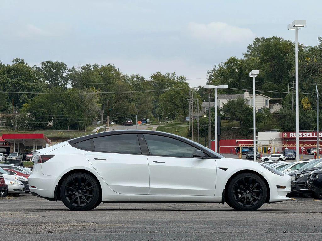 used 2023 Tesla Model 3 car, priced at $27,499