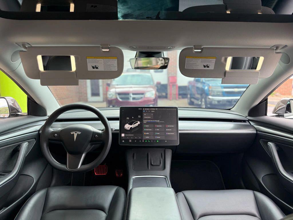 used 2023 Tesla Model 3 car, priced at $27,499