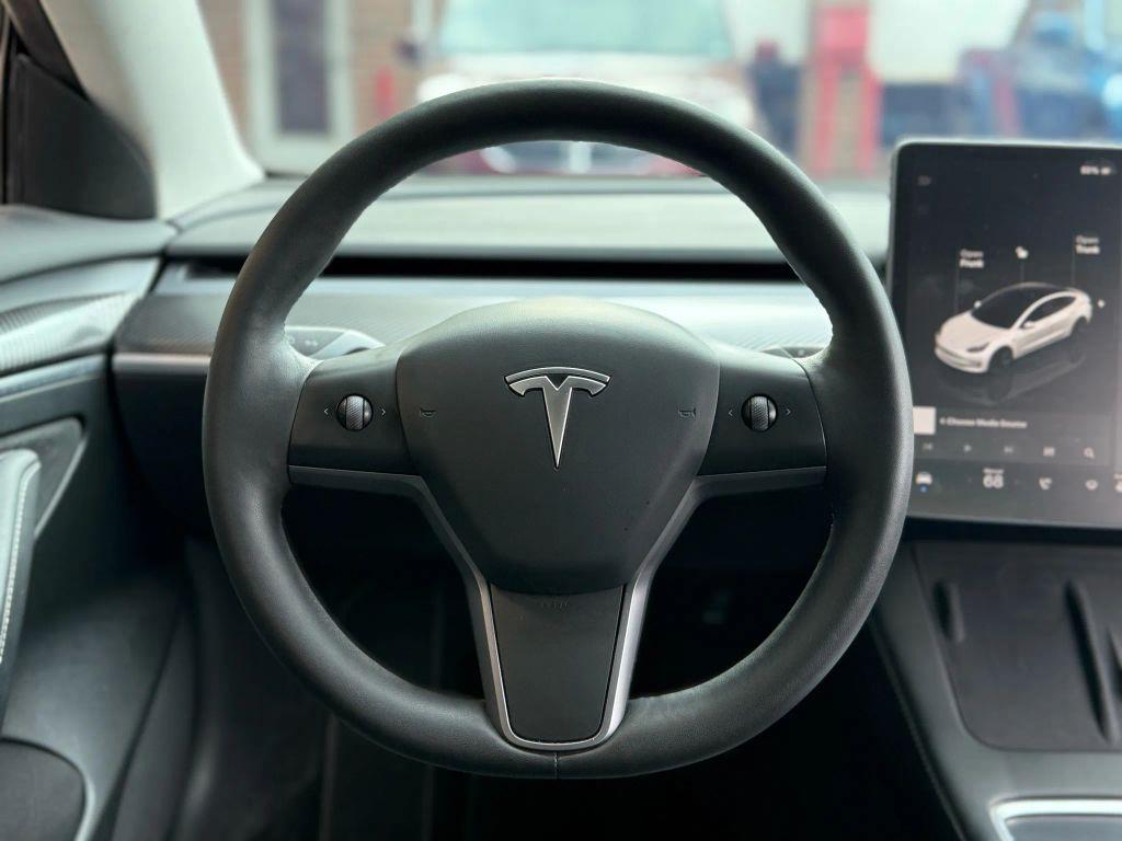 used 2023 Tesla Model 3 car, priced at $27,499
