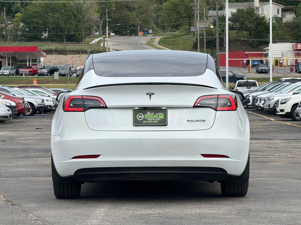 used 2023 Tesla Model 3 car, priced at $27,499