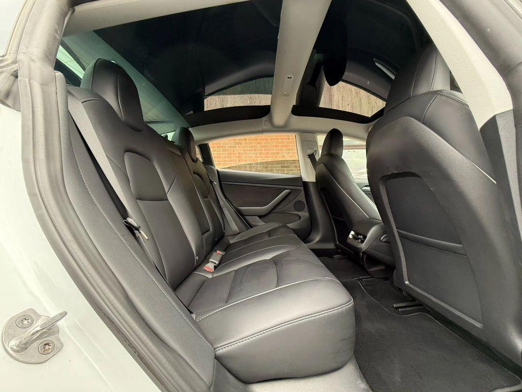 used 2023 Tesla Model 3 car, priced at $27,499