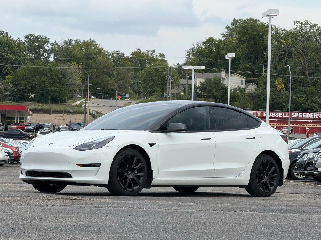 used 2023 Tesla Model 3 car, priced at $27,499