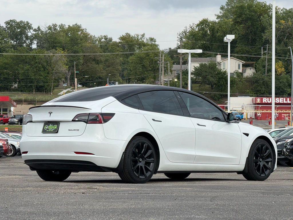 used 2023 Tesla Model 3 car, priced at $27,499