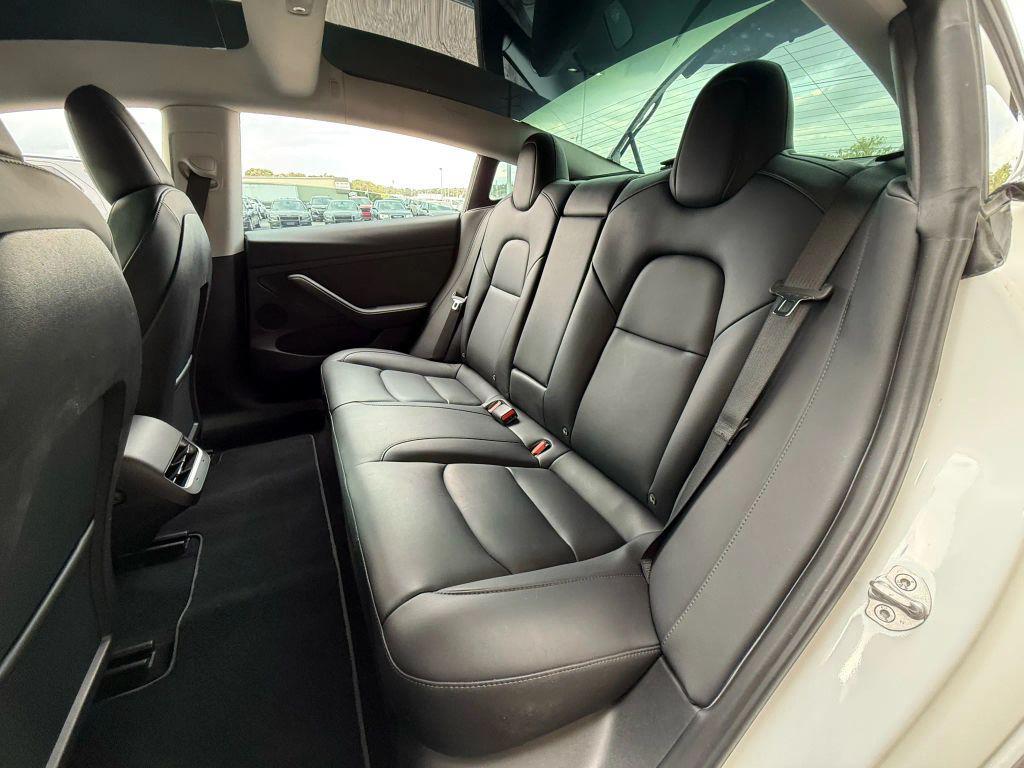 used 2023 Tesla Model 3 car, priced at $27,499