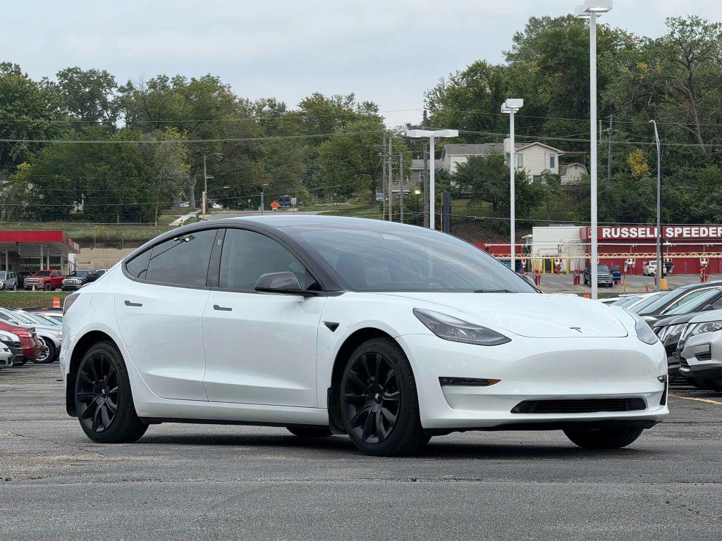 used 2023 Tesla Model 3 car, priced at $27,499