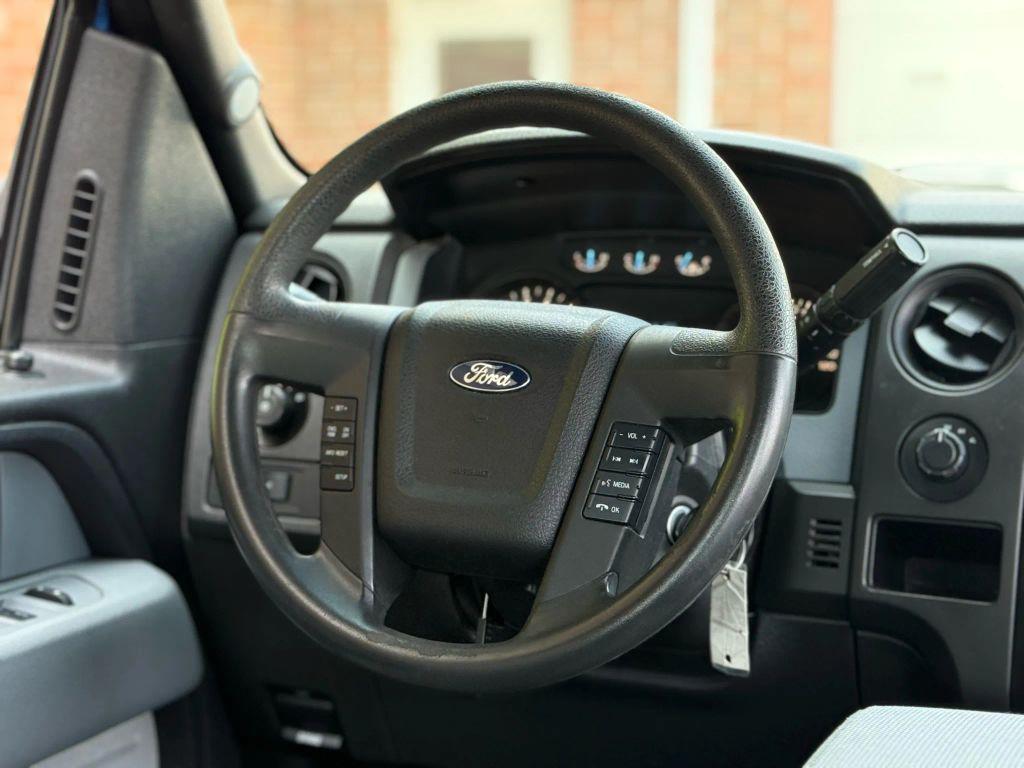 used 2014 Ford F-150 car, priced at $15,999