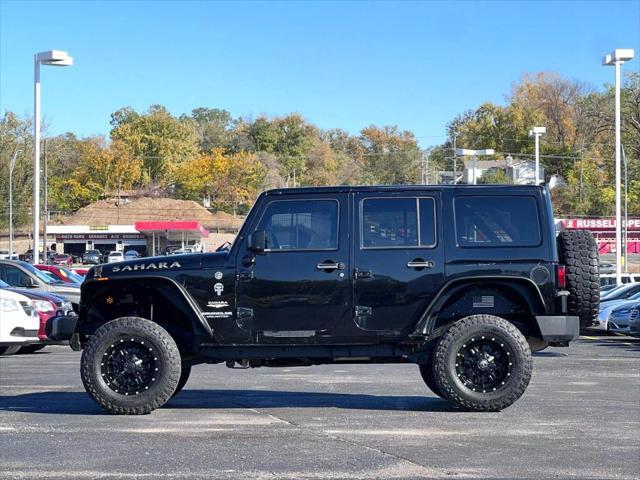 used 2014 Jeep Wrangler Unlimited car, priced at $18,999