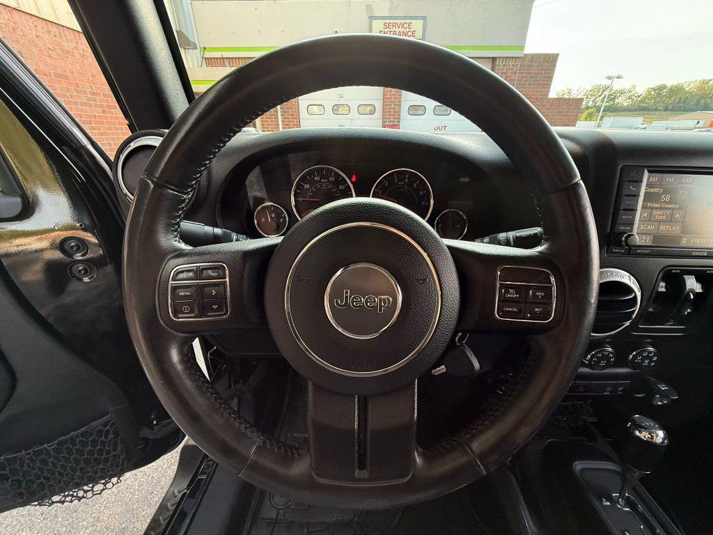 used 2016 Jeep Wrangler Unlimited car, priced at $13,999