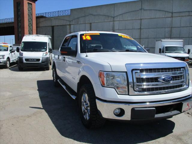 used 2014 Ford F-150 car, priced at $14,000