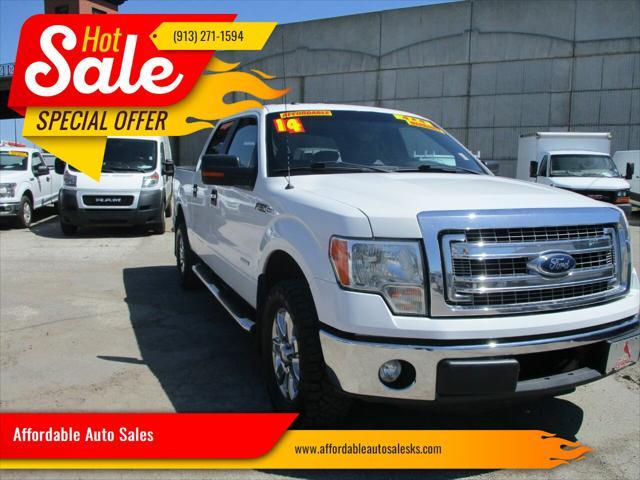 used 2014 Ford F-150 car, priced at $14,000