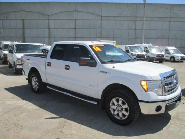 used 2014 Ford F-150 car, priced at $14,000