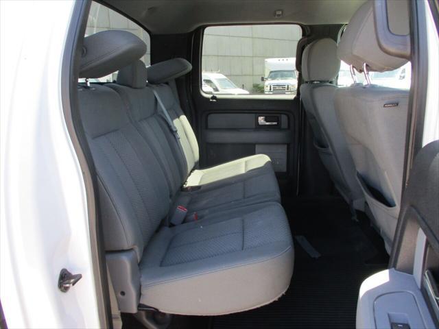 used 2014 Ford F-150 car, priced at $14,000