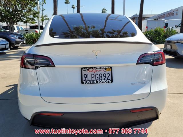 used 2024 Tesla Model Y car, priced at $48,998