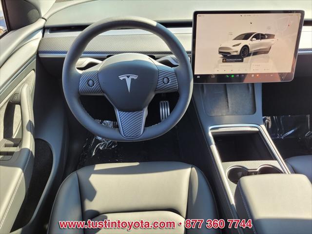 used 2024 Tesla Model Y car, priced at $48,998