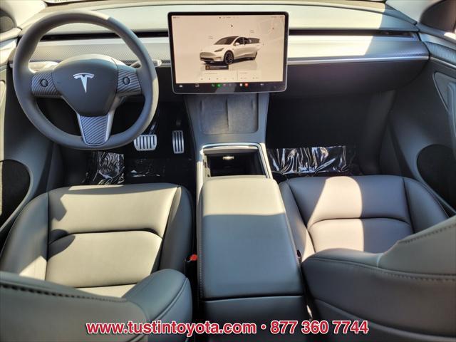 used 2024 Tesla Model Y car, priced at $48,998