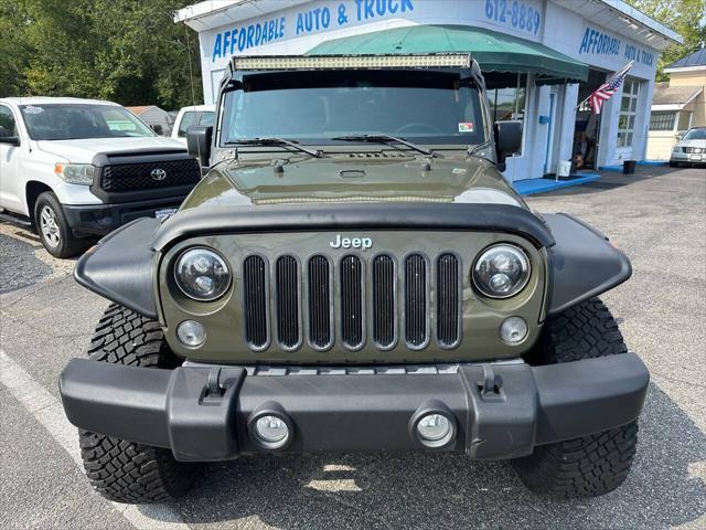 used 2015 Jeep Wrangler Unlimited car, priced at $22,389