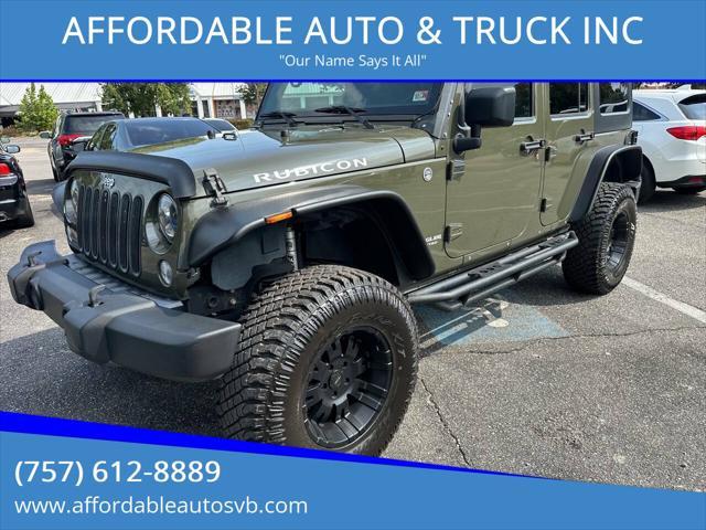 used 2015 Jeep Wrangler Unlimited car, priced at $22,389