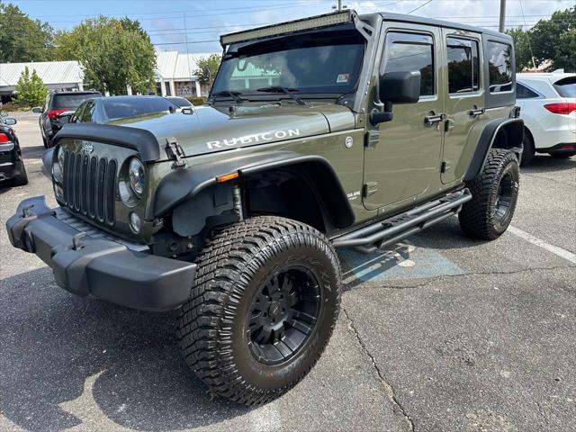 used 2015 Jeep Wrangler Unlimited car, priced at $22,389