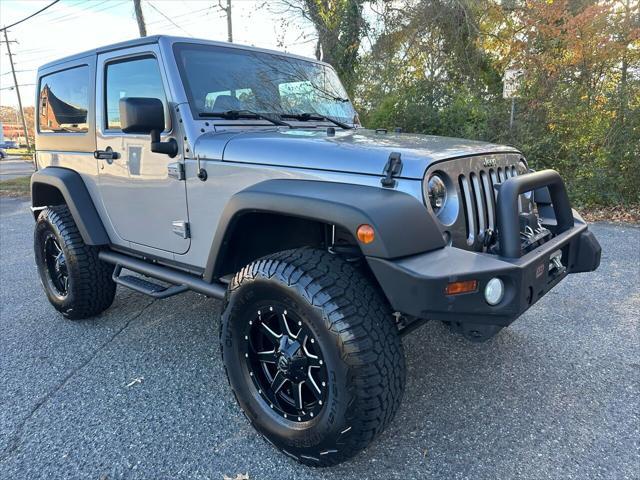 used 2016 Jeep Wrangler car, priced at $23,687