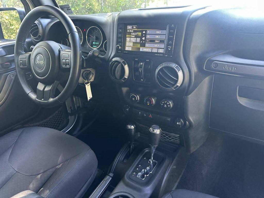 used 2015 Jeep Wrangler Unlimited car, priced at $18,437