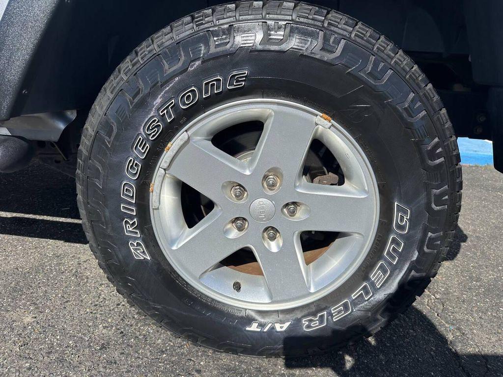 used 2015 Jeep Wrangler Unlimited car, priced at $18,437
