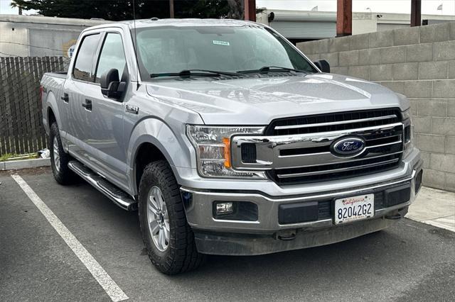 used 2018 Ford F-150 car, priced at $27,499