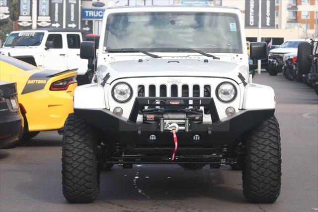 used 2018 Jeep Wrangler JK Unlimited car, priced at $25,995