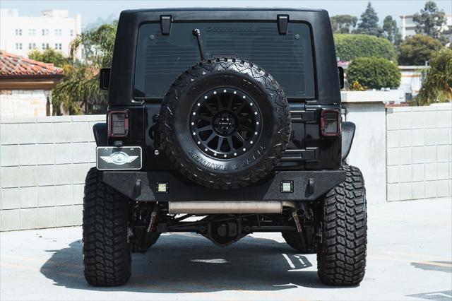 used 2018 Jeep Wrangler JK car, priced at $23,495