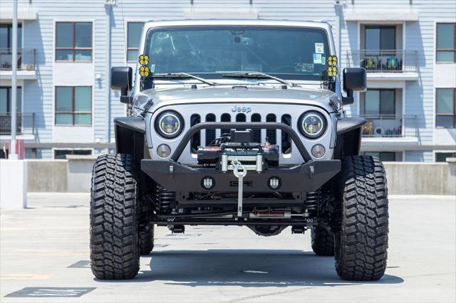 used 2018 Jeep Wrangler JK Unlimited car, priced at $25,995