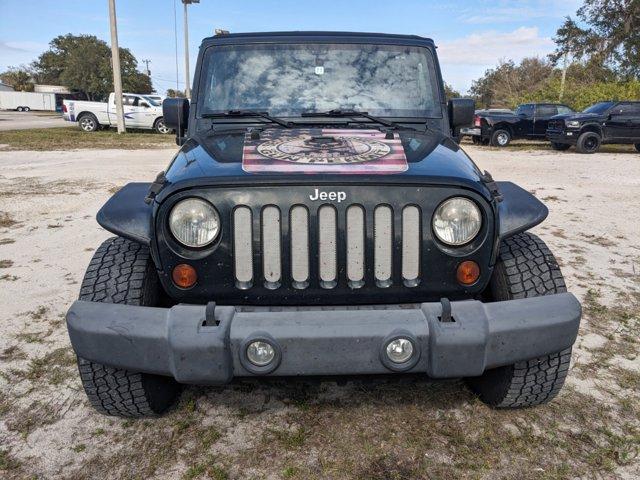 used 2012 Jeep Wrangler Unlimited car, priced at $16,784