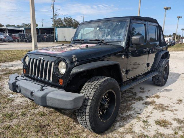 used 2012 Jeep Wrangler Unlimited car, priced at $16,784