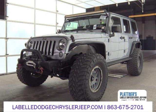 used 2015 Jeep Wrangler Unlimited car, priced at $19,825