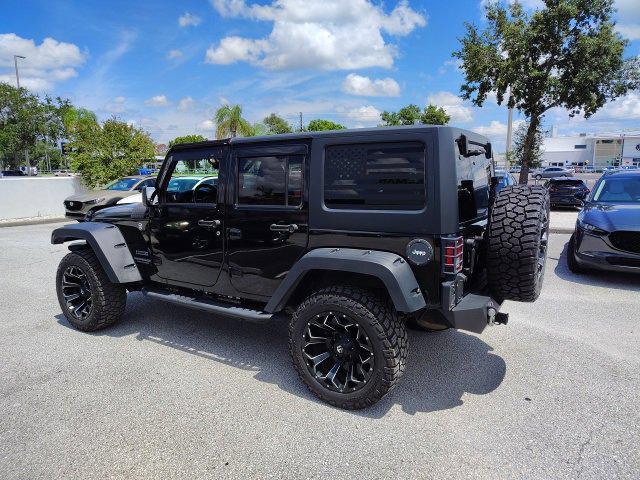 used 2015 Jeep Wrangler Unlimited car, priced at $13,487