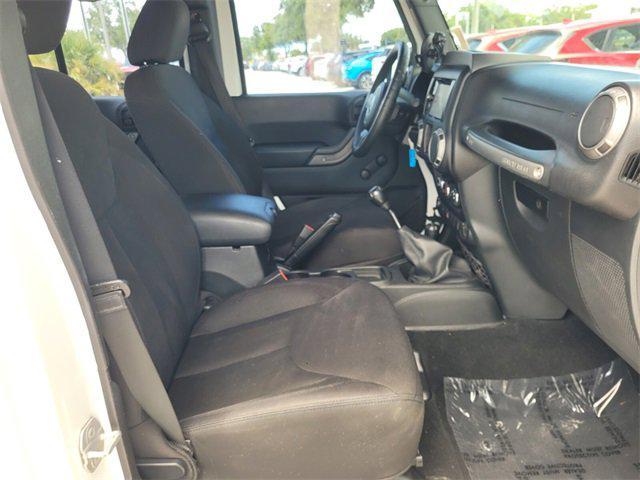 used 2015 Jeep Wrangler Unlimited car, priced at $16,487