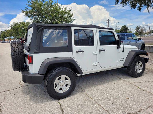 used 2015 Jeep Wrangler Unlimited car, priced at $16,487