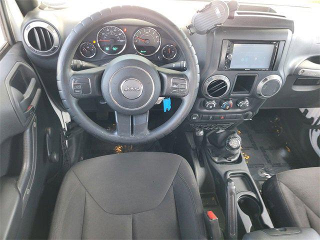 used 2015 Jeep Wrangler Unlimited car, priced at $16,487