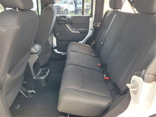 used 2015 Jeep Wrangler Unlimited car, priced at $16,487
