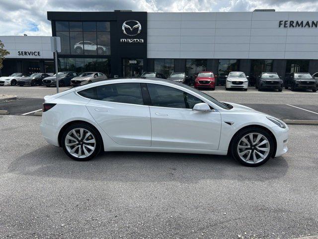 used 2020 Tesla Model 3 car, priced at $15,000