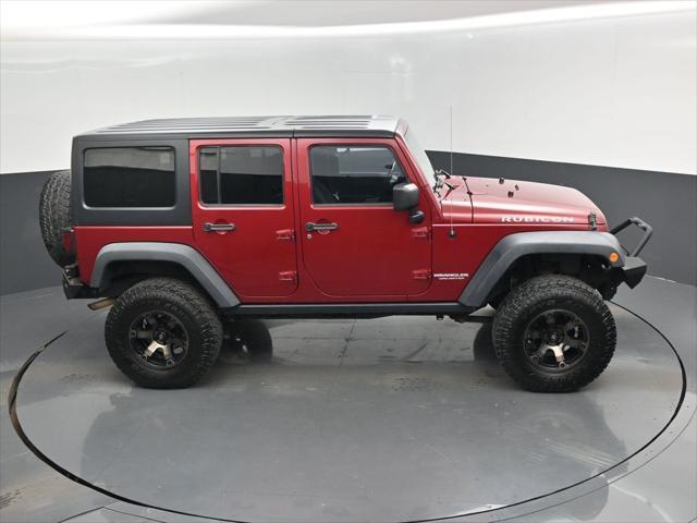 used 2012 Jeep Wrangler Unlimited car, priced at $14,995