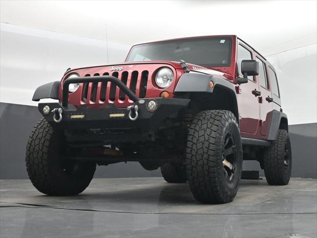 used 2012 Jeep Wrangler Unlimited car, priced at $14,995