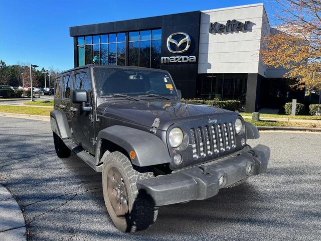 used 2014 Jeep Wrangler Unlimited car, priced at $16,628