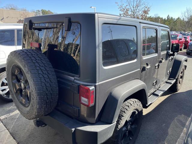 used 2014 Jeep Wrangler Unlimited car, priced at $16,628