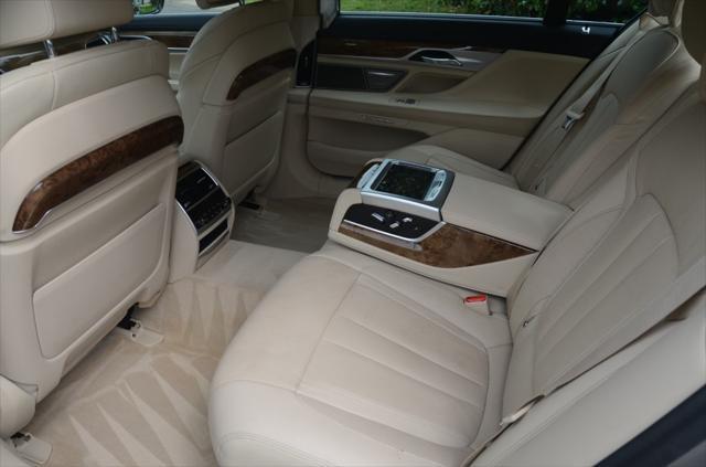 used 2016 BMW 740 car, priced at $16,990