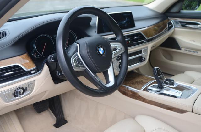 used 2016 BMW 740 car, priced at $16,990