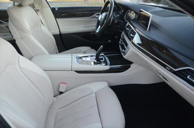 used 2016 BMW 740 car, priced at $22,990