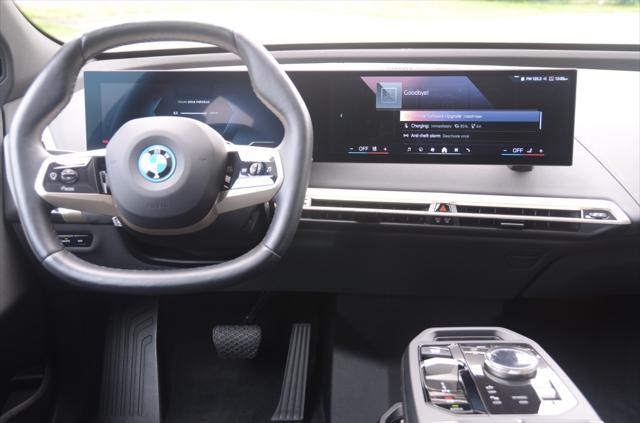 used 2025 BMW iX car, priced at $67,990