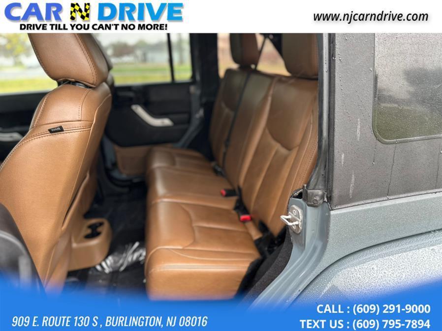 used 2014 Jeep Wrangler Unlimited car, priced at $11,879