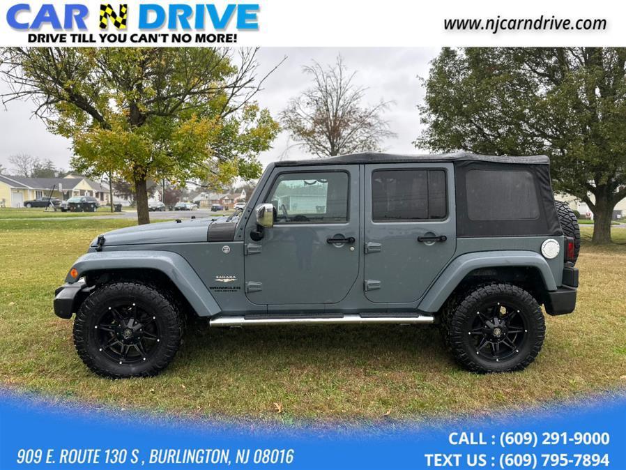 used 2014 Jeep Wrangler Unlimited car, priced at $11,879