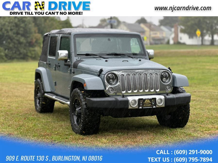 used 2014 Jeep Wrangler Unlimited car, priced at $11,879